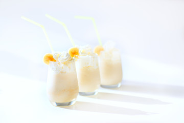three Glasses of banana milk shake