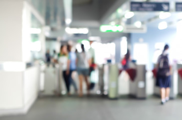 motion blur of people enter Subway or sky train in the station