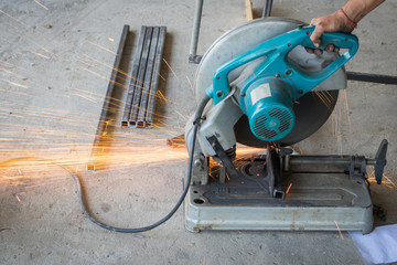 Mechanic use cut off saw machine cutting steel unsafe on protection.