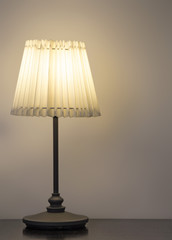 Desk lamp on the wood table