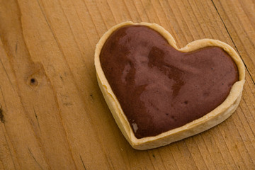 Fototapeta na wymiar heart shape chocolate tart