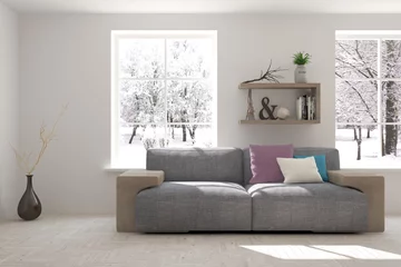 Schilderijen op glas White room with sofa and winter landscape in window. Scandinavian interior design. 3D illustration © AntonSh