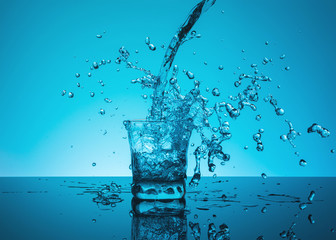 Сreative splashing water in the glass