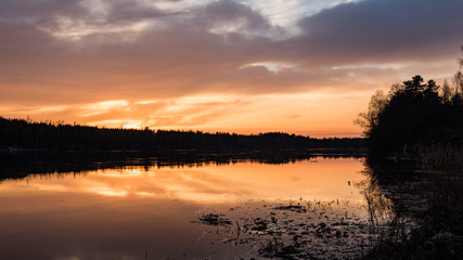 Fototapeta na wymiar sunset over the river Daugava