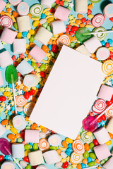 Colorful marshmallow candies and jellies as background