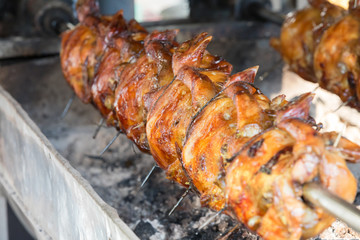 chickens with their heads on a skewer
