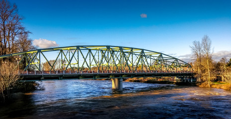 Naklejka premium Bridge Over River