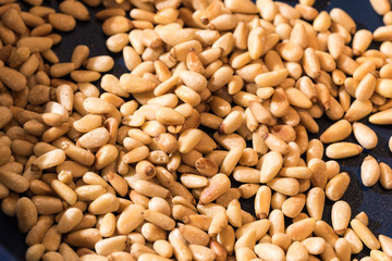Pan with rosted pine nuts