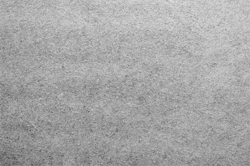 Blank sheet of paper or plywood in grey colours.