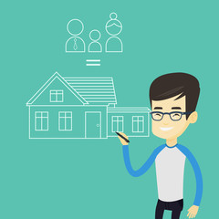 Young asian man drawing family house.