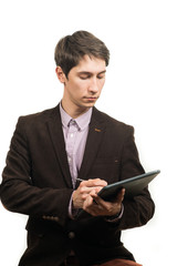 Smart businessman holding a sheet of paper and pen