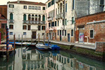 Fototapeta na wymiar Evening on the canal street in Venice, Italy.