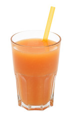 grapefruit juice in a glass with straw on a white background