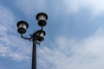 Vintage classic street light lamp decoration with clear blue sky