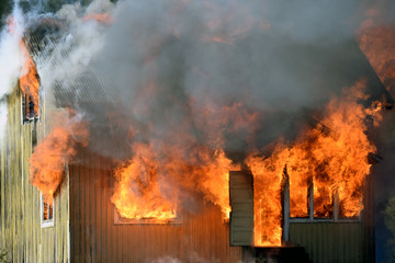 House completely engulfed in flames