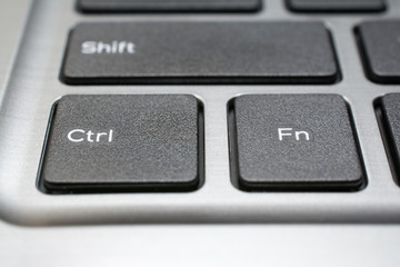 Modern laptop keyboard closeup
