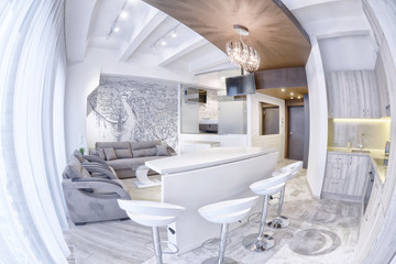 Russia, Moscow region - interior design kitchen - living room in luxury new apartment