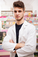 Doctor in front of his desk at work