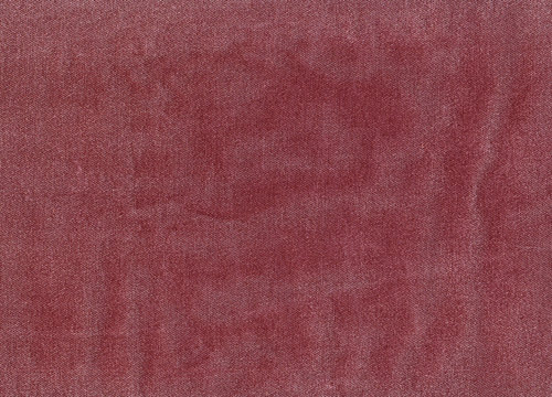 Red denim textile texture.