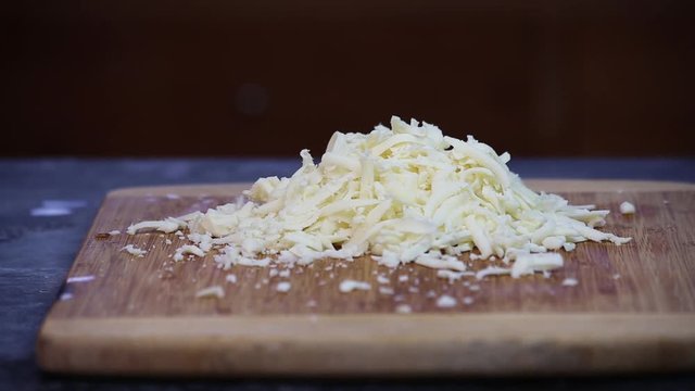 Pile of fresh grated mozzarella cheese for a pizza. 