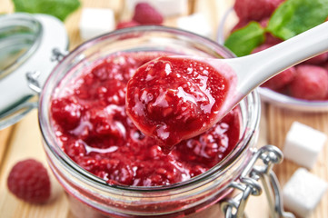 Raspberry jam in a jar. Homemade fruit jam