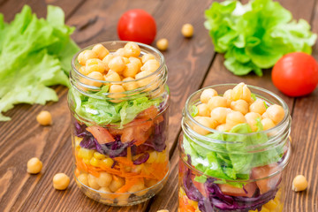 Fresh salad with garbanzo beans and vegetables