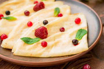 Homemade fresh pancakes with berries