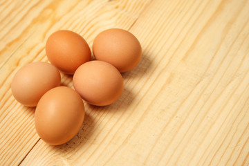 eggs on a wooden background. top view