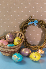 Fototapeta na wymiar Easter eggs with gold marble decorations on the beige background