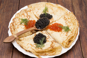 crepes with black and red caviar