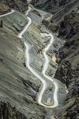 Amazing mountain serpentine road near Lamayuru - Tibet, Kargil district, Leh district, Western Ladakh, Himalayas, Jammu and Kashmir, Northern India - 141272656