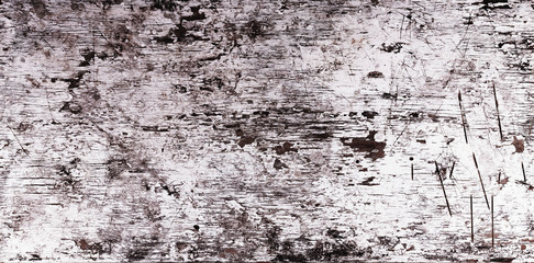 Wood surface with peeling paint.Dirty, weathered black and white wall.Vertical Texture.Old abstract background