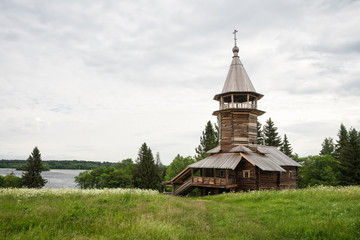 Fototapeta na wymiar Old wooden chapel on the Onega lake, Kizhi