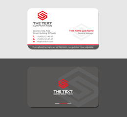 gray business card with red letter s