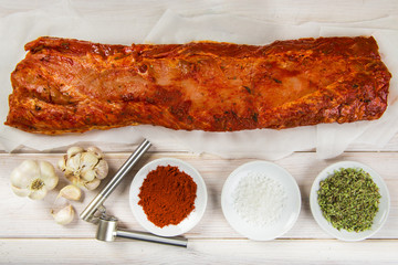 Carne de lomo de cerdo en adobo con orégano, ajo, pimentón y sal para freír y conservar