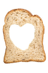 Corn,fresh, healthy slice of bread close with a hole in the heart shape isolated on white background