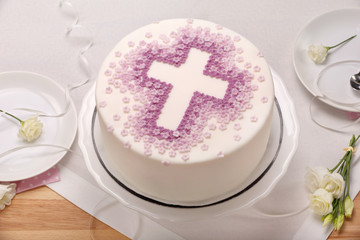 Fototapeta na wymiar first holy communion cake on the table
