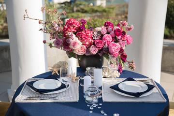Table setting at a luxury wedding or another catered event. Marine themes
