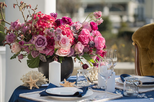 Table setting at a luxury wedding or another catered event. Marine themes