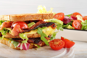 Sandwich with pork cheese and salad