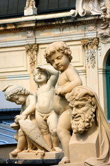 Fototapeta na wymiar Richly sculptured Rampart Pavilion. Zwinger Palace (architect Matthaus Poppelmann) - royal palace 17 century in Dresden,