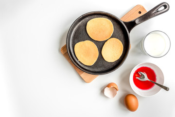 cooking pancake on white background top view ingredients for making