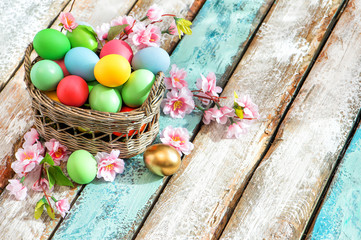 Easter eggs basket colorful decoration flowers
