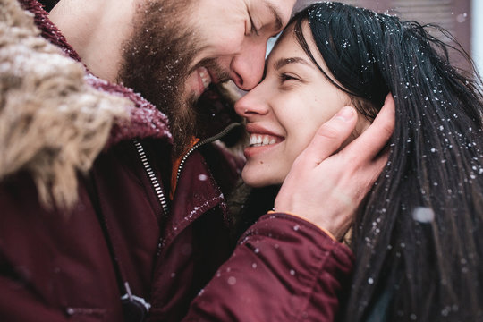 Young Couple Having Fun On The Snow