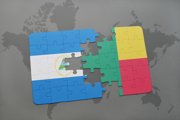 puzzle with the national flag of nicaragua and benin on a world map