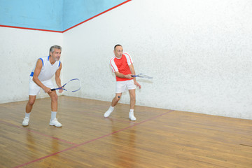 men playing squash