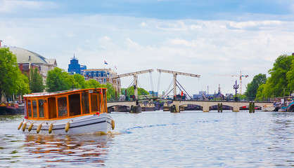 View of the canal with a drawbridge in Amsterdam