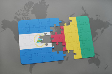 puzzle with the national flag of nicaragua and guinea on a world map