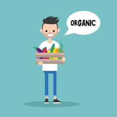 Young vegetarian bearded man holding a crate full of fruits and vegetables / editable flat vector illustration, clip art