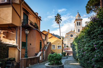 Fototapeta na wymiar Beautiful church and traditional architecture of Portofino town, Italy